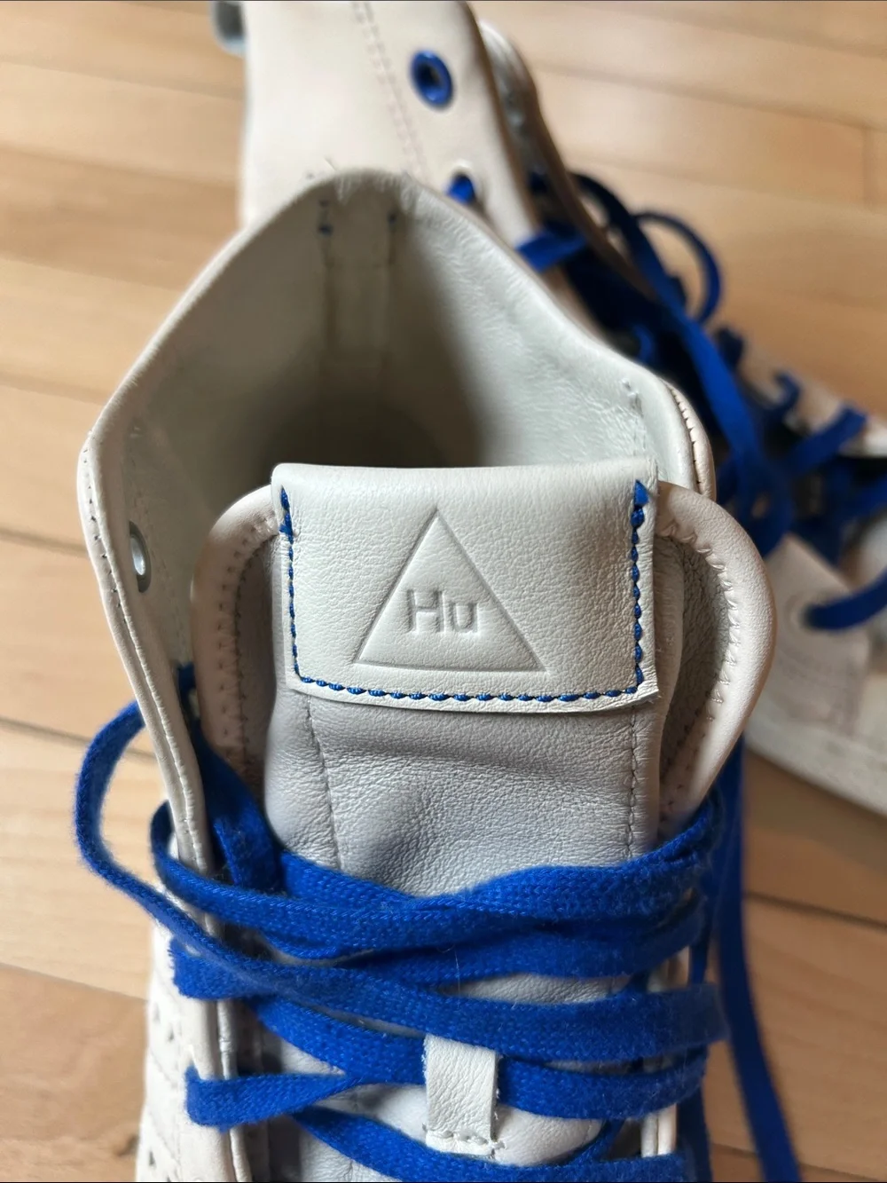 adidas human race White High-Top Sneakers